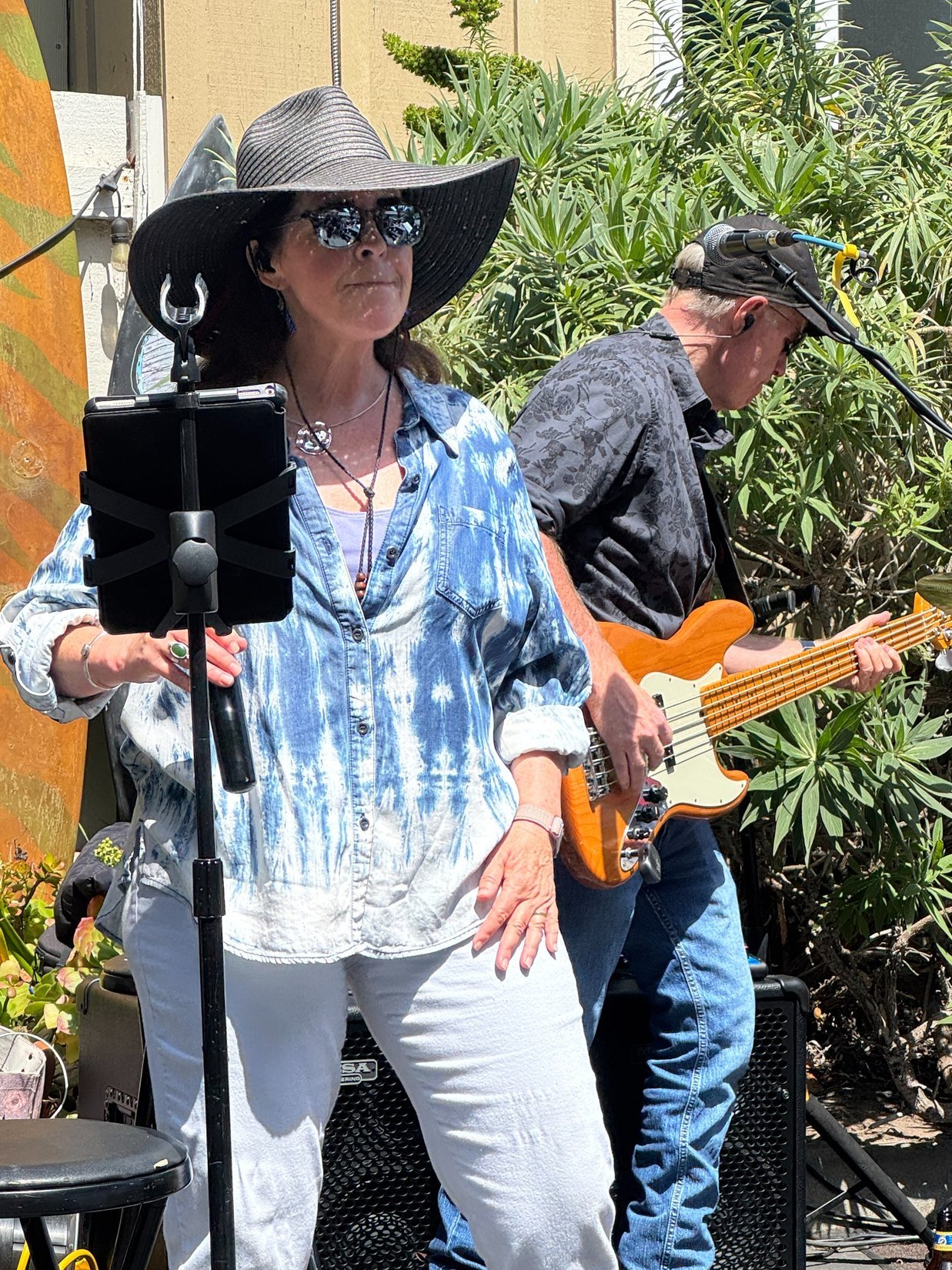 Kate Daniel performing with a microphone